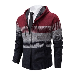 Detail of men's knit cardigan featuring a warm fleece lining and tricolor patchwork design