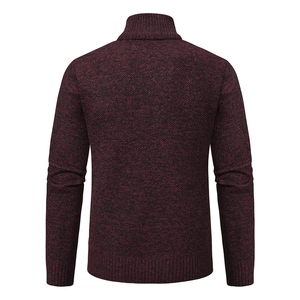 Detail view of the back of a men's knit sweater with black and burgundy marl texture