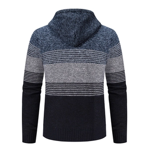 Macro view of the knitted back panel with navy and grey color-block striped pattern