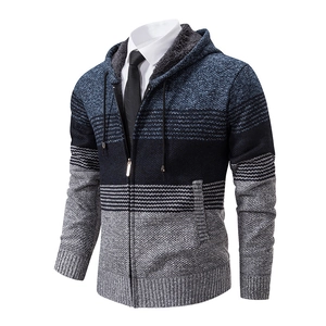 Detail of hooded knit cardigan showing grey fleece lining and striped texture