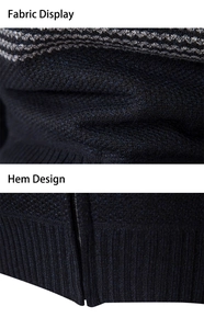 Detail of navy knit cardigan showing thick fabric texture and ribbed hem design