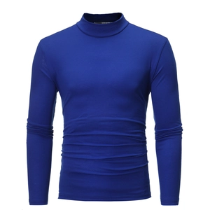 Close-up of royal blue slim fit long sleeve shirt with mock neck collar and knit texture