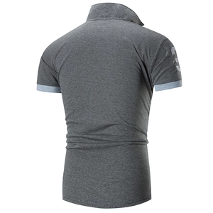 Detailed back view of dark gray polo shirt with contrast cuffs and sleeve embroidery