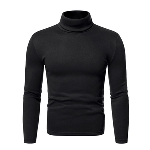 Close-up of the high turtleneck collar and premium knit texture on a black men's sweater