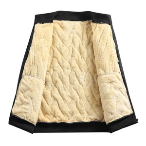 Detail of men's winter vest with thick fleece lining and quilted diamond pattern