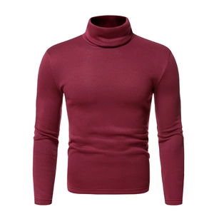 Macro detail of men's slim fit turtleneck sweatshirt in rich dark burgundy fleece fabric