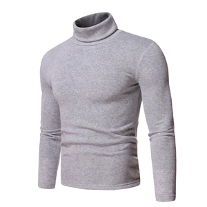 Close-up of the light gray fleece lining and textured fabric on the men's turtleneck sweater