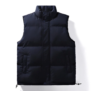 Men's navy blue quilted puffer vest with stand collar and adjustable drawstring hem