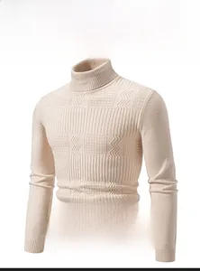 Close-up of beige turtleneck sweater featuring geometric wave and checkerboard knit patterns