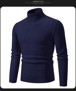Detail of navy blue turtleneck sweater featuring complex knitted stripe and plaid textures