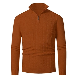 Detailed view of men's cable knit sweater featuring a quarter-zip collar and ribbed cuffs