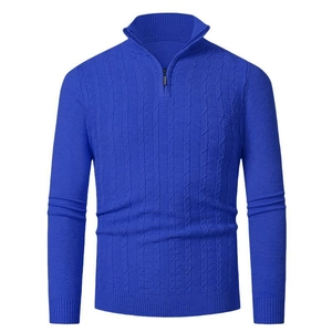 Detail of royal blue knitted sweater featuring vertical cable knit pattern and 1/4 zipper