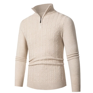 Detailed texture of oatmeal half-zip knit sweater featuring cable knit and ribbed cuffs