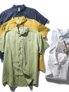 Men's short sleeve linen shirts in various colors like navy, yellow, and green