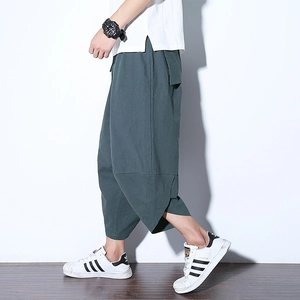 Pantaloni harem da uomo in lino verde scuro con ampie tasche laterali in stile giapponese