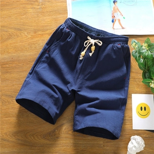 Deep blue linen shorts for men with elastic drawstring waist and stylish wood bead details