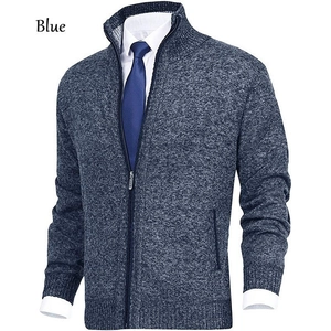Close-up of blue men's knitted cardigan featuring high stand collar and metal zipper