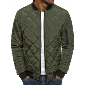 Close-up of utility zipper pocket on olive green quilted bomber jacket sleeve