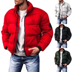 Detail of winter puffer jacket with stand collar, horizontal quilting, and logo patch on arm