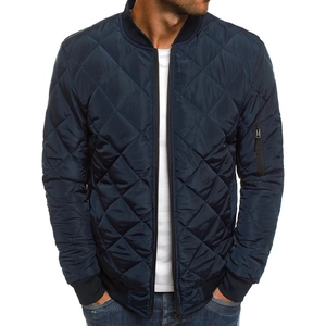 Men's navy blue quilted bomber jacket with diamond stitching and sleeve pocket