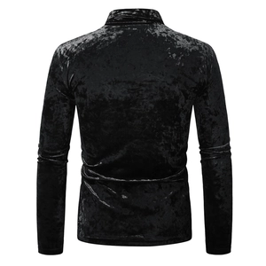 Macro detail of the plush black velvet fabric texture on the men's slim fit turtleneck shirt