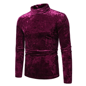 Close-up of wine red velvet fabric texture on slim fit men's turtleneck long sleeve t-shirt