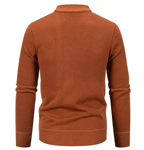 Rear view of rust red V-neck knit cardigan with ribbed cuffs and hem detail