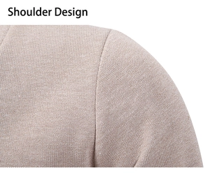 Detailed view of oatmeal knitted sweater shoulder design with premium stitching
