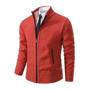 Detail of knit pattern and zipper on men's orange-red stand collar cardigan jacket