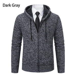 Detailed close-up of dark gray fleece lining and zipper on men knit cardigan