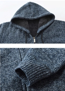 Detail of navy knit cardigan with warm fleece lining, metal zipper and ribbed cuffs