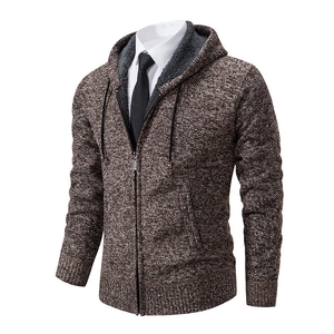 Close-up of knit texture and gray fleece lining on a men's zip-up hooded cardigan