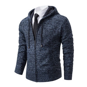 Close-up of men's knitted cardigan showing thick fleece lining and durable metal zipper