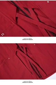 Detail of dark red Chinese style coat featuring crisscross ties and white contrast stitching