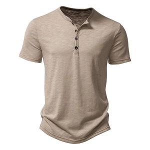 Close-up of khaki slub cotton fabric and 3-button Henley collar on casual polo shirt