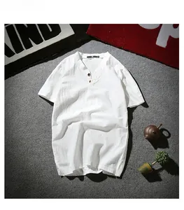 Detail of white cotton linen shirt showing Henley neck with two wooden buttons