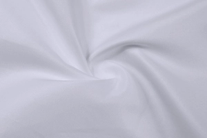 Close-up detail of white twill weave fabric texture for men's business casual dress shirt