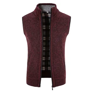 Detail of wine red knitted vest with full zipper and warm plaid fleece lining texture