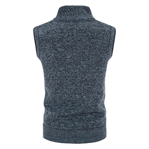 Detail view of the thick knit texture and ribbed hem on the blue-grey men's vest