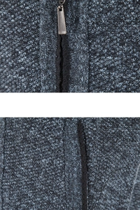 Close-up of vintage metal zipper and high-density ribbed texture on men knit sweater vest