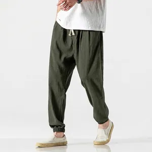 Mens dark green linen harem pants with drawstring waist and elastic ankles for daily casual wear