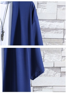 Detail of navy blue ice silk sun protection jacket with kimono collar and size label