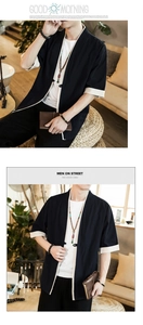 Detail of loose fit linen Zen style jacket with contrasting cuffs and wooden beads