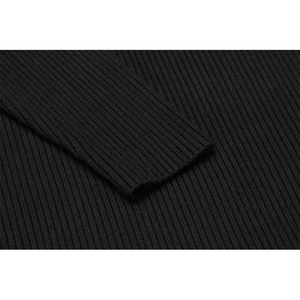Close-up detail of black ribbed knit cuffs and texture on men's winter sweater