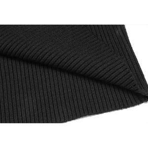 Close-up of black ribbed knit fabric showing elastic vertical texture and thick weave