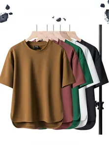 Close-up of assorted color breathable cotton t-shirts with curved split hems on a rack