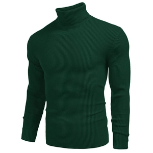Detail of dark green turtle neck sweater showing fine ribbed knit texture and slim fit design