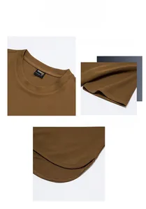 Detail of crew neck and irregular curved hem on durable brown piqué fabric t-shirt
