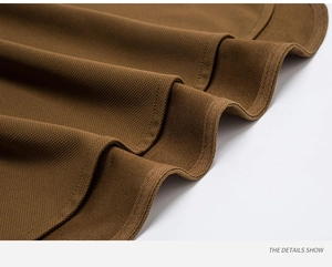 Macro shot of dark coffee pique fabric texture with breathable honeycomb weave details