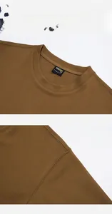 Detail of brown CORDURA fabric T-shirt showing collar tag and durable mesh texture